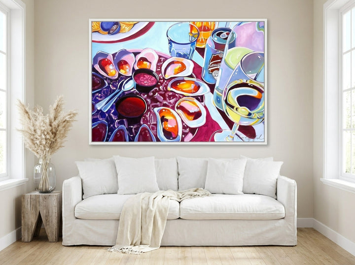 Oversized statement modern wall art print styled on the wall in a coastal living room