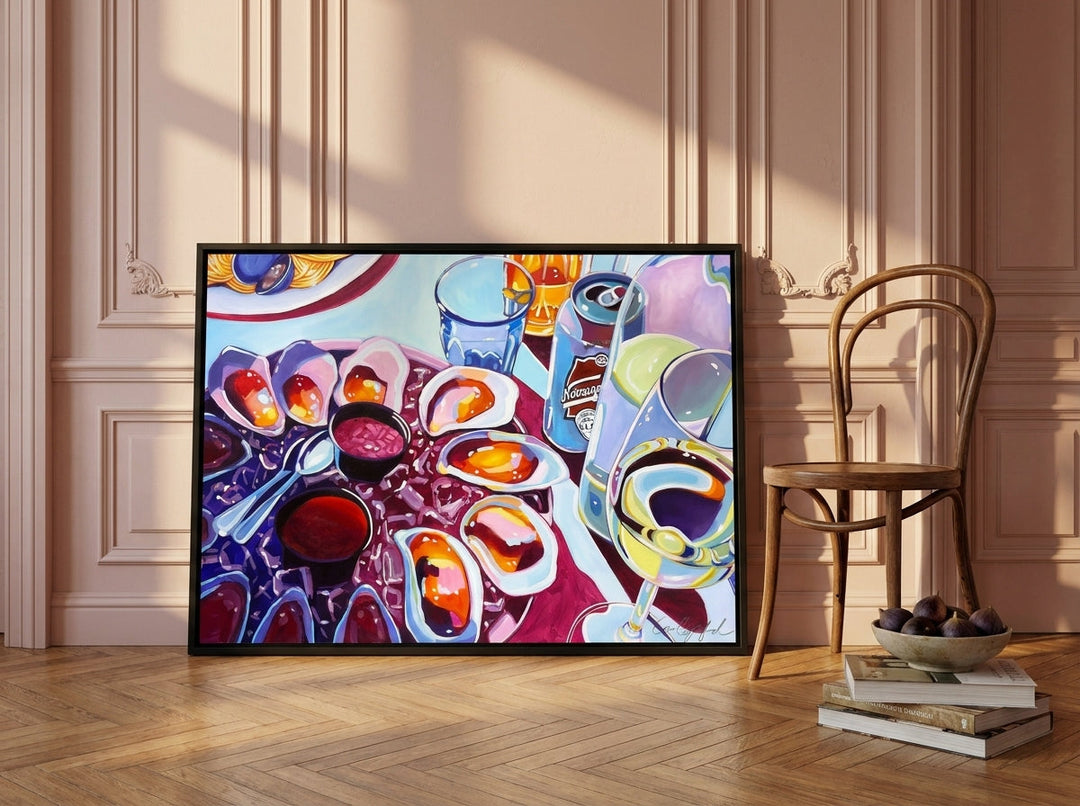 Oversized statement canvas wall art with a black surround leaning against the wall in a Parisian living room