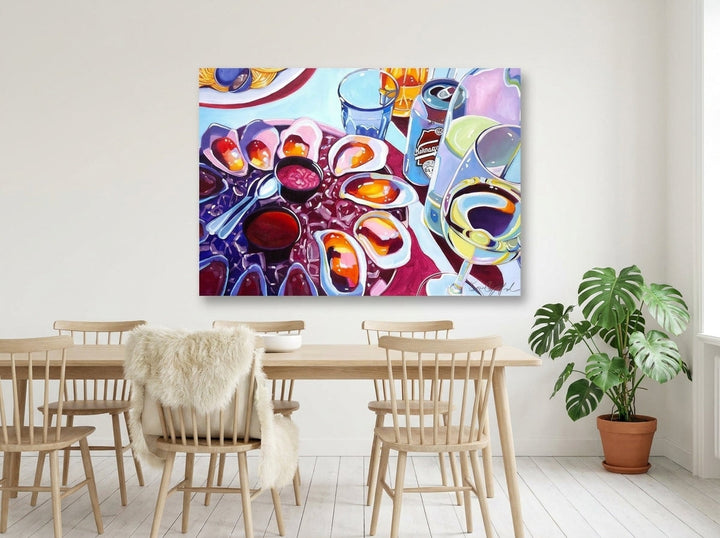 Stretched canvas wall art styled on the wall in a bright Scandinavian dining room