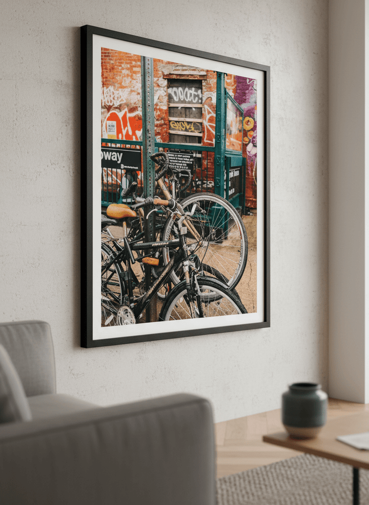 Modern wall art styled above a sofa in a neutral living room