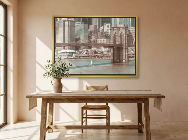Canvas wall art with a gold leaf surround styled on the wall in a Mediterranean home office