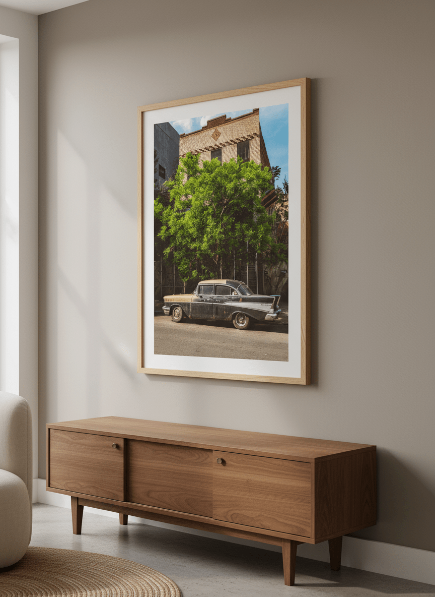 Modern wall art styled above a sofa in a neutral living room