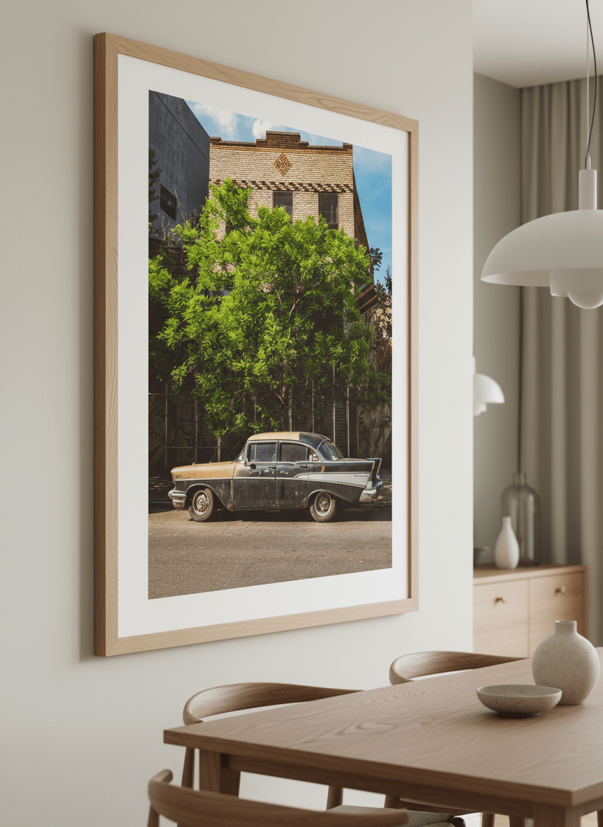 Wall art styled above a dining table in a contemporary home