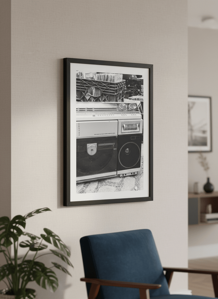 Modern wall art styled above a sofa in a neutral living room