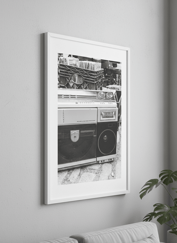 Modern wall art styled above a sofa in a neutral living room