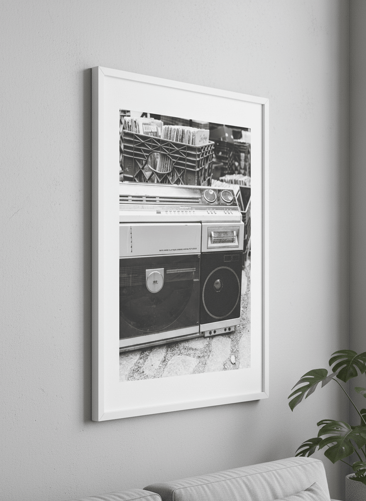 Modern wall art styled above a sofa in a neutral living room