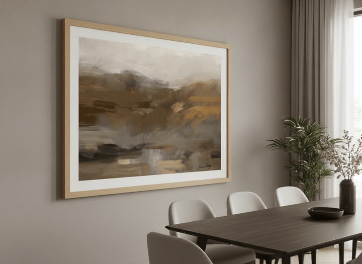 Wall art styled above a dining table in a contemporary home