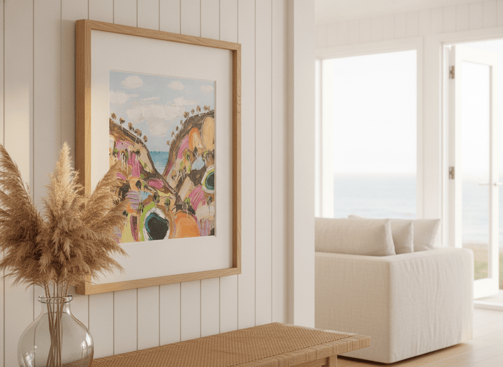 Neutral wall art displayed in a sunny coastal beach house
