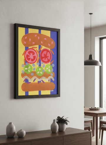 Wall art styled above a dining table in a contemporary home
