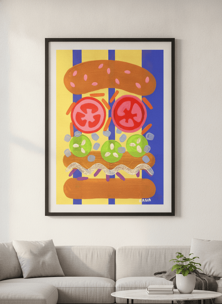 Modern wall art styled above a sofa in a neutral living room