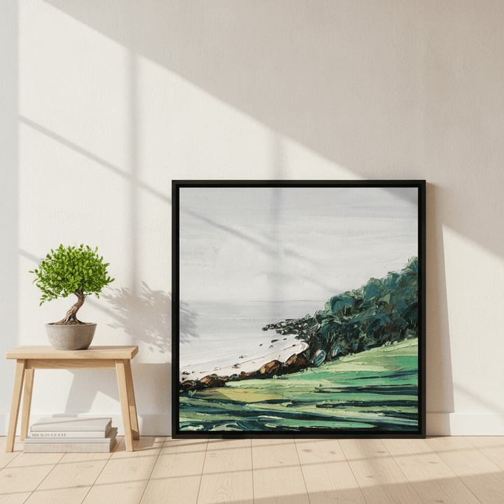 Canvas wall art with a black surround leaning against the wall in a warm Japandi home office