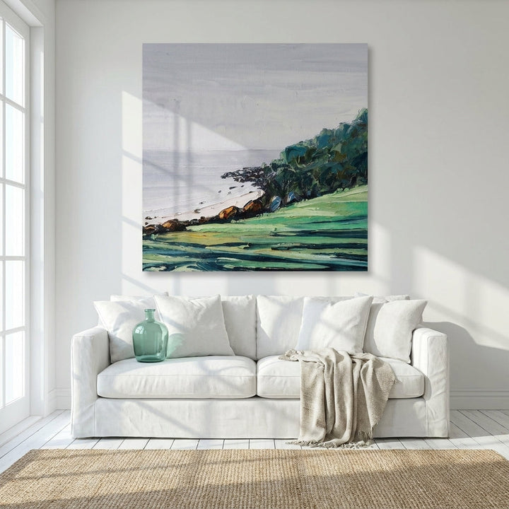 Stretched canvas wall art styled on the wall in a coastal living room