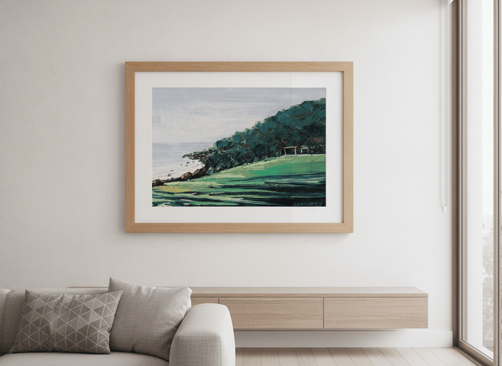 Modern wall art styled above a sofa in a neutral living room