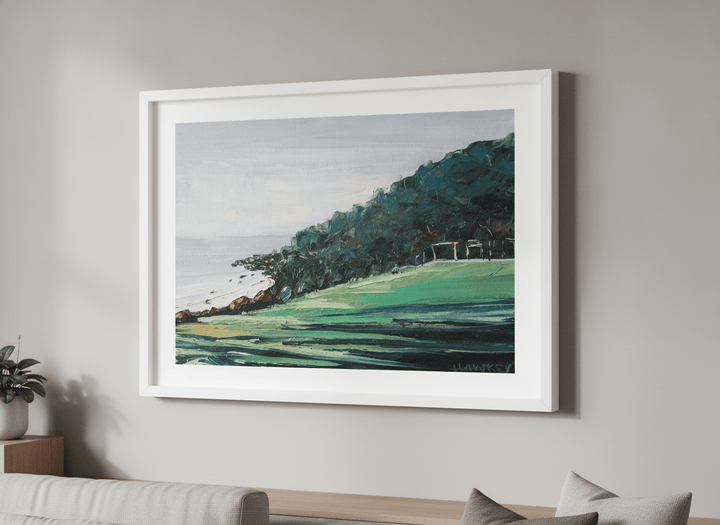 Modern wall art styled above a sofa in a neutral living room