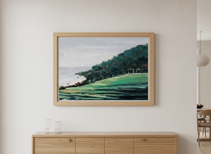 Wall art styled above a dining table in a contemporary home