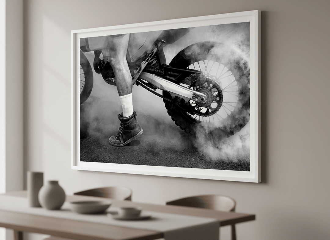 Wall art styled above a dining table in a contemporary home