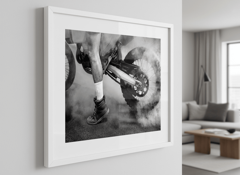 Modern wall art styled above a sofa in a neutral living room