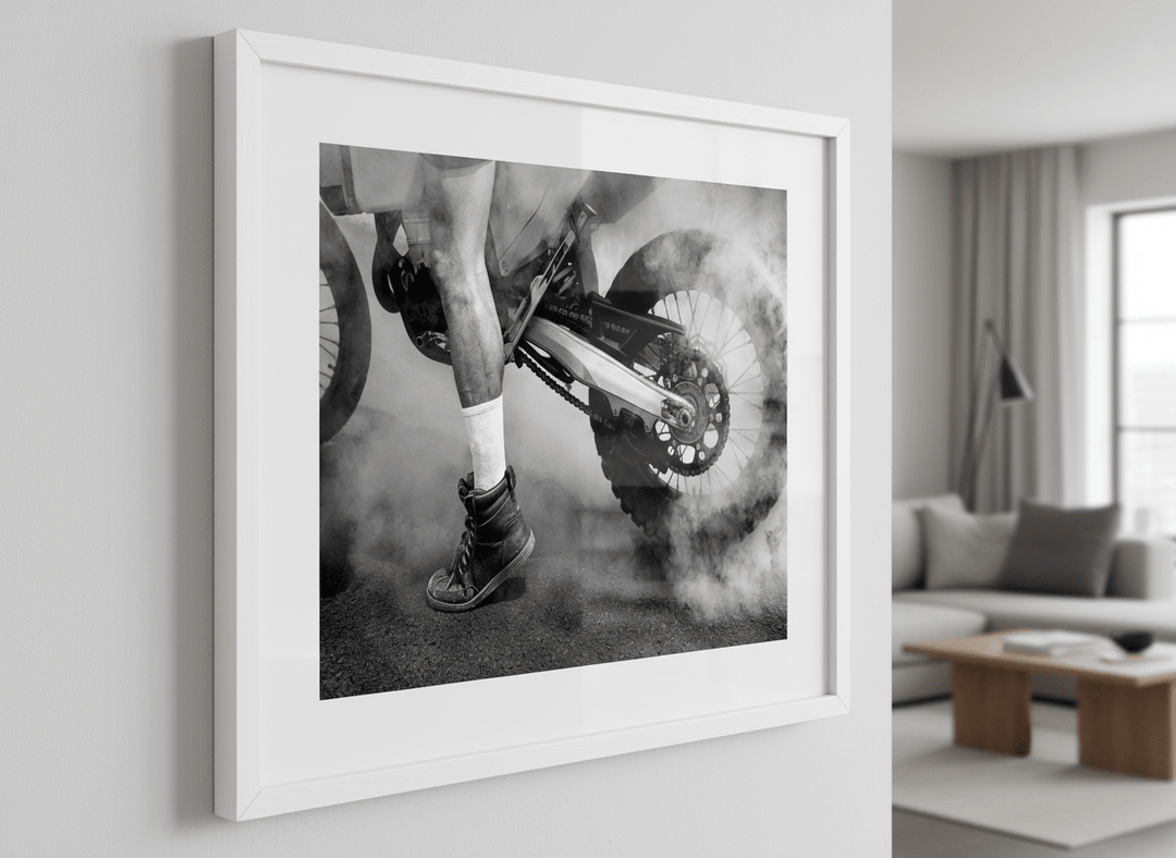 Modern wall art styled above a sofa in a neutral living room