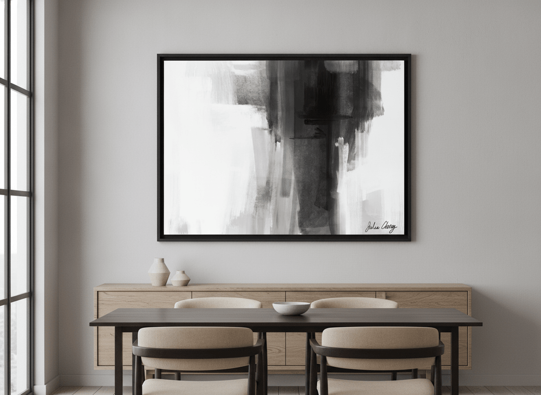 Wall art styled above a dining table in a contemporary home