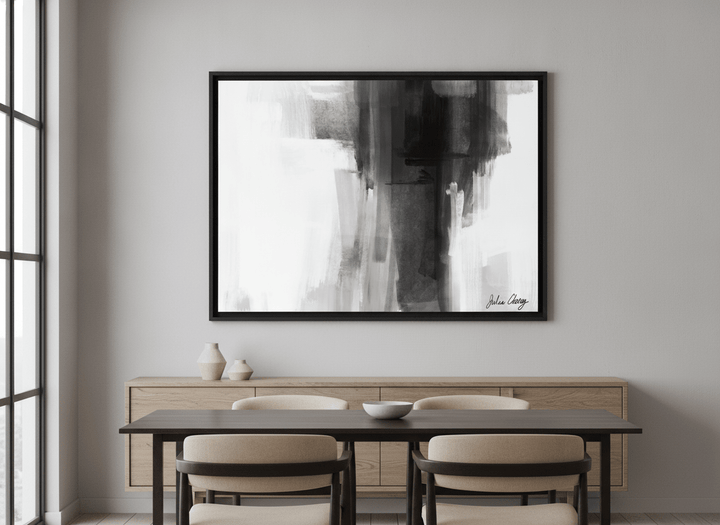 Wall art styled above a dining table in a contemporary home