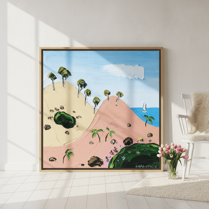 Oversized statement canvas wall art with a natural timber surround leaning against the wall in a bright Scandinavian living room