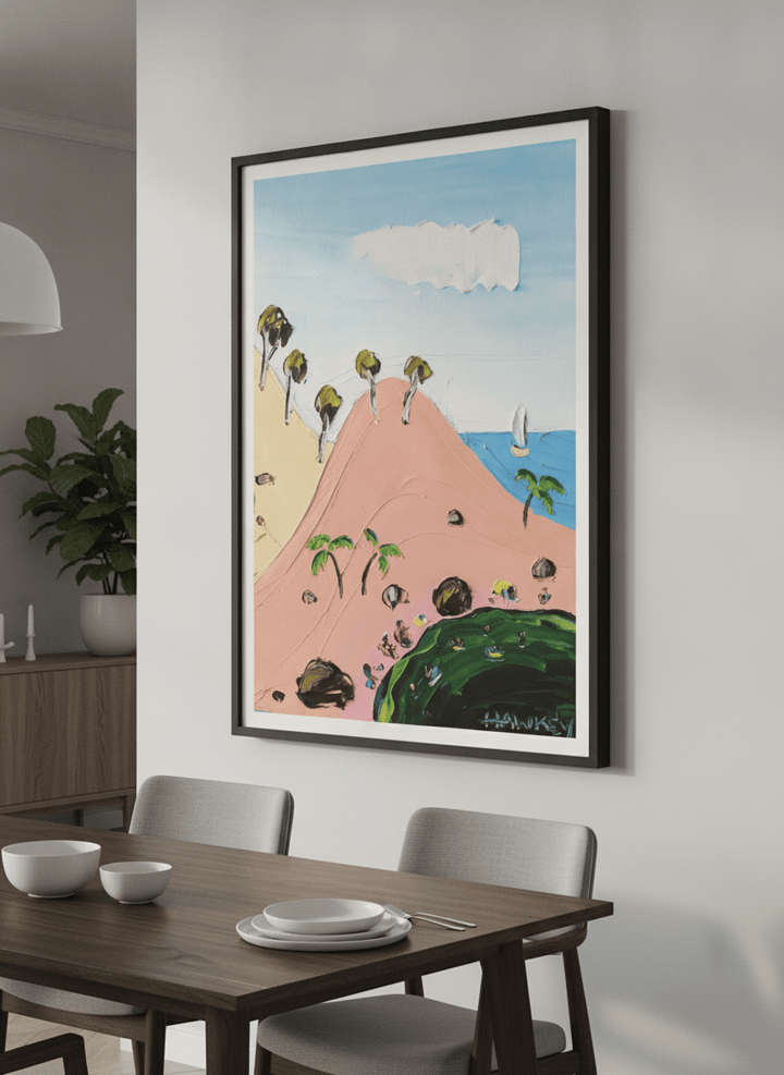 Wall art styled above a dining table in a contemporary home