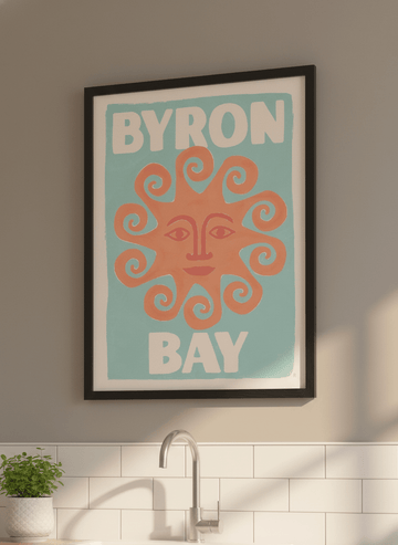 Artwork styled on the wall of a bright modern kitchen
