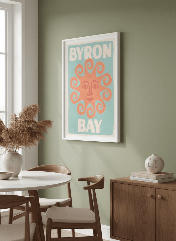Wall art styled above a dining table in a contemporary home