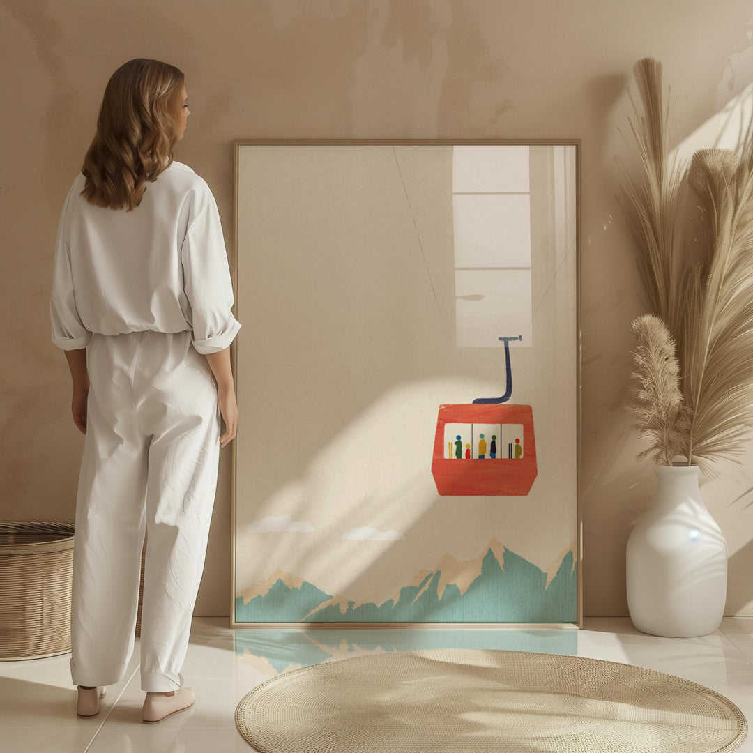 Woman standing in a room looking at  artwork on the wall.