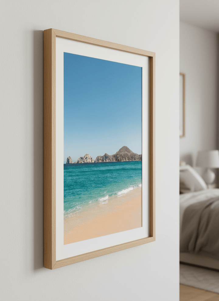 Minimalist artwork displayed in a calm, light-filled bedroom interior