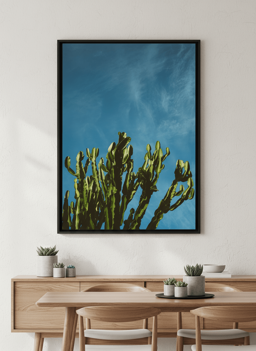 Wall art styled above a dining table in a contemporary home