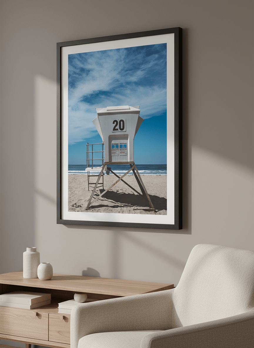 Modern wall art styled above a sofa in a neutral living room