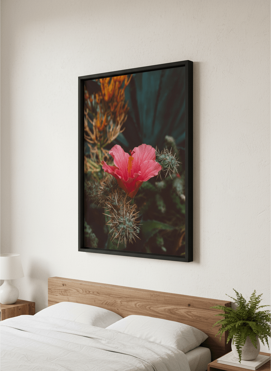 Minimalist artwork displayed in a calm, light-filled bedroom interior