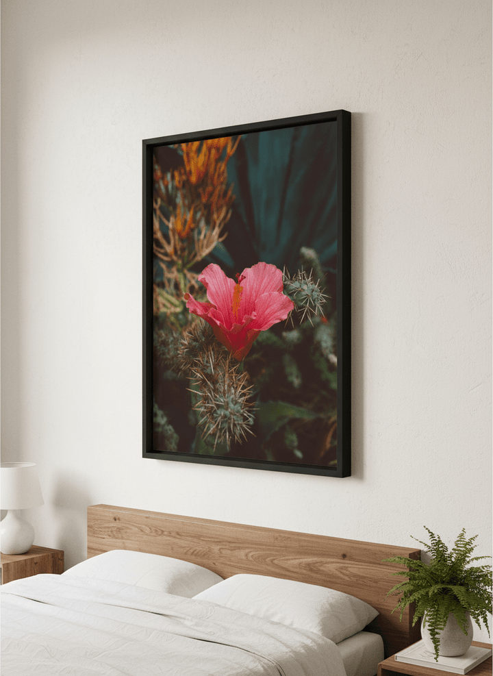 Minimalist artwork displayed in a calm, light-filled bedroom interior