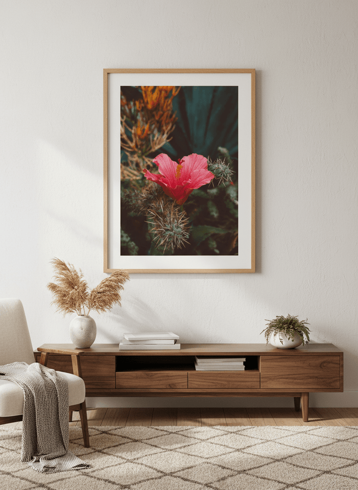 Modern wall art styled above a sofa in a neutral living room