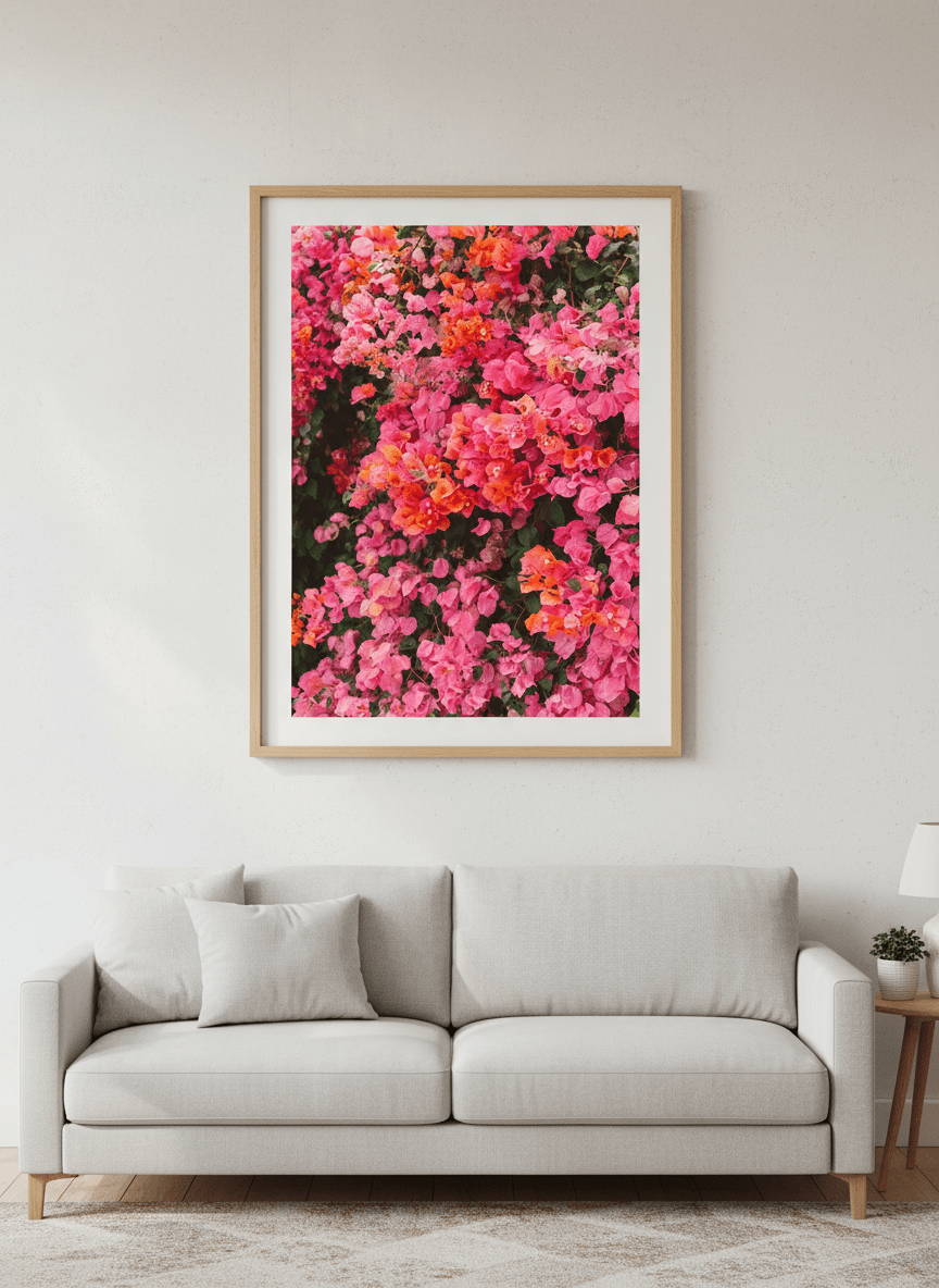 Modern wall art styled above a sofa in a neutral living room