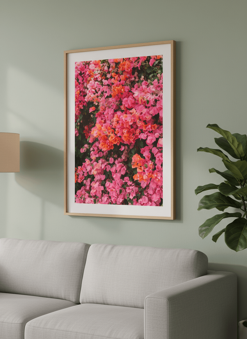 Modern wall art styled above a sofa in a neutral living room
