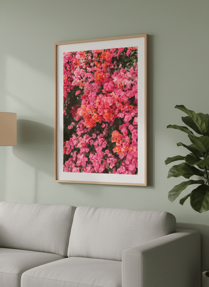 Modern wall art styled above a sofa in a neutral living room
