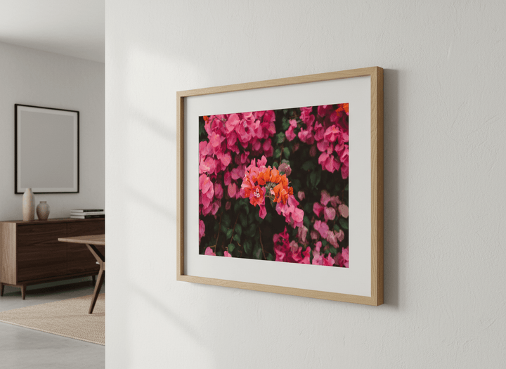 Wall art styled above a dining table in a contemporary home