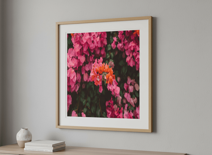 Modern wall art styled above a sofa in a neutral living room