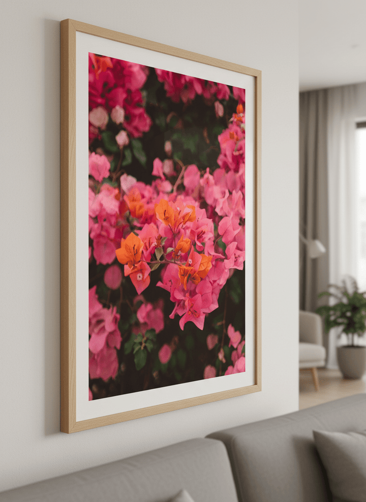 Modern wall art styled above a sofa in a neutral living room