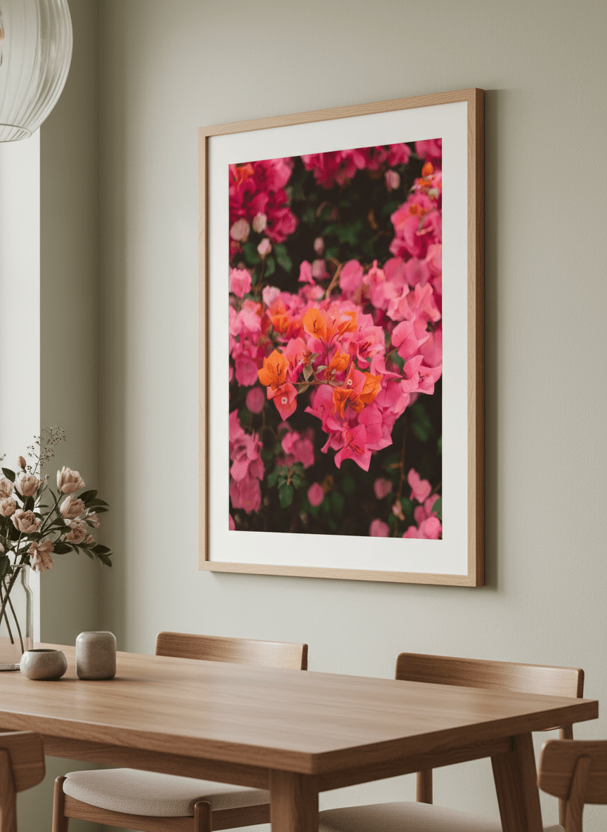 Wall art styled above a dining table in a contemporary home