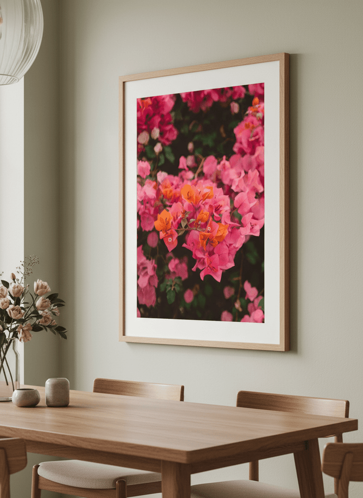 Wall art styled above a dining table in a contemporary home