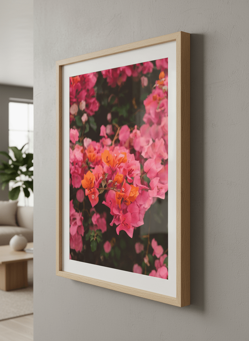 Modern wall art styled above a sofa in a neutral living room