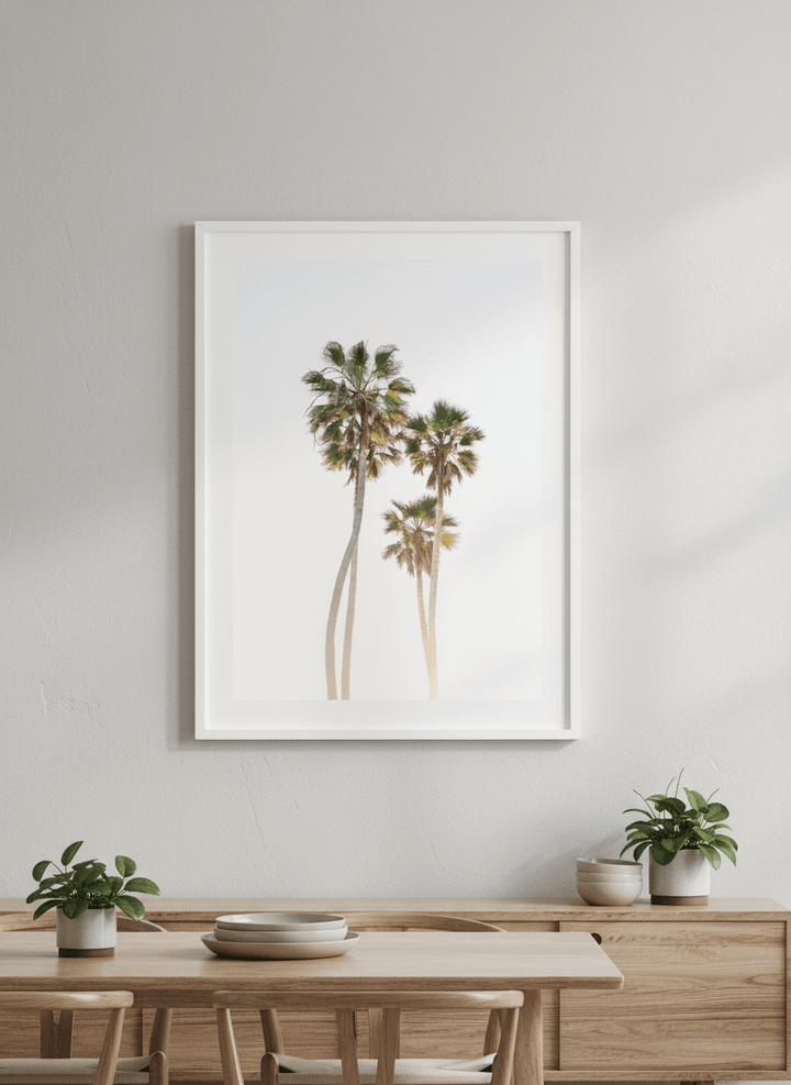 Wall art styled above a dining table in a contemporary home