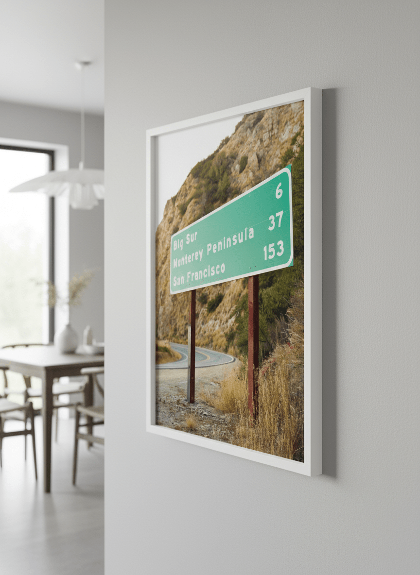Wall art styled above a dining table in a contemporary home