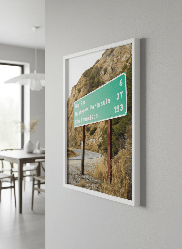 Wall art styled above a dining table in a contemporary home