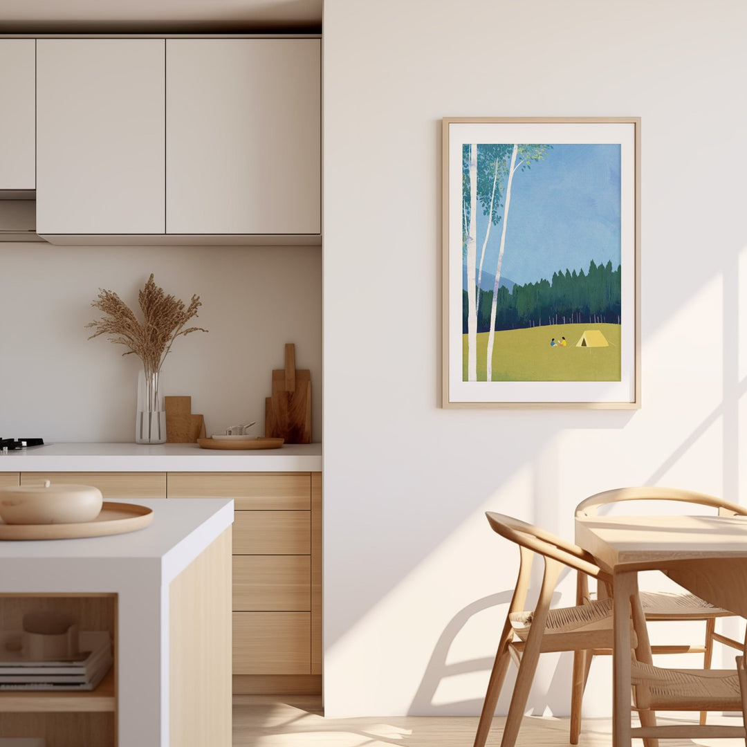Modern kitchen with an artwork of a nature scene on the wall.