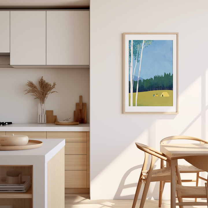 Modern kitchen with an artwork of a nature scene on the wall.