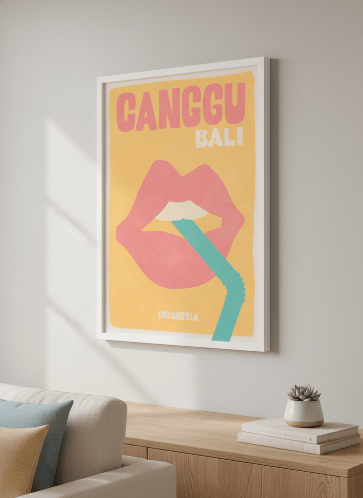 Modern wall art styled above a sofa in a neutral living room